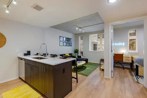 Kitchen living room study area bedroom living room Image at HERE Seattle in Seattle Student Accommodation
