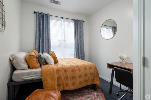 Bed desk mirror and globe bedroom at Paloma Kent in Kent Student Accommodation