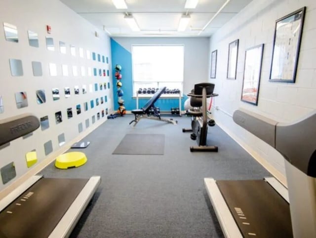 Treadmills exercise bike weight bench fitness gym at HH Cresmont Apartments in Baltimore Student Accommodation