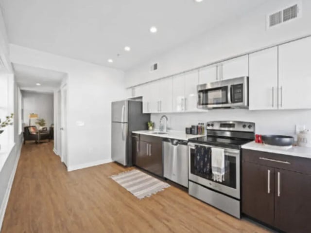 Modern kitchen with stainless steel appliances and cabinets kitchen at The Legacy at Powelton Village in Philadelphia Student Accommodation