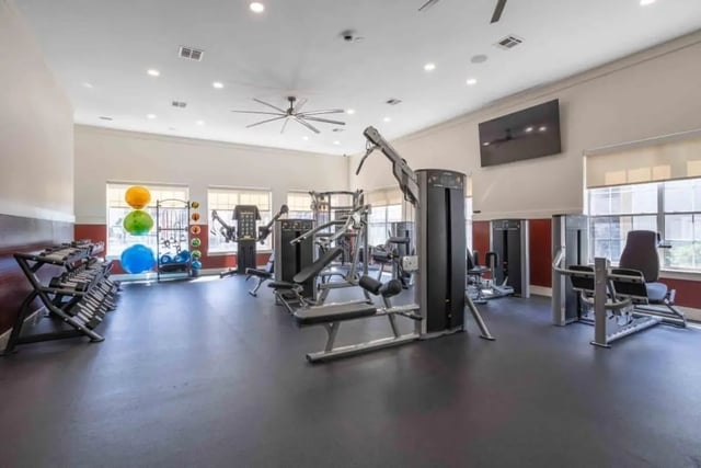 Weights machines exercise balls rack fitness gym at University Trails College Station in College Station Student Accommodation