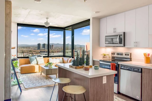 Living area with kitchen and city view Living area kitchen at The Carmin in Tempe Student Accommodation