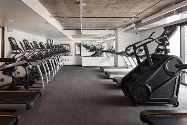 Elliptical machines treadmills stair climber gym fitness area at The Carmin in Tempe Student Accommodation