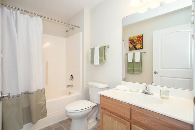 Toilet shower vanity sink with towels bathroom at Mountain Valley Apartments in Morgantown Student Accommodation