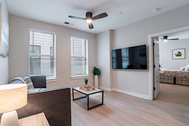 Sofa television and coffee table living room at The Edition on Rosemary in Chapel Hill Student Accommodation