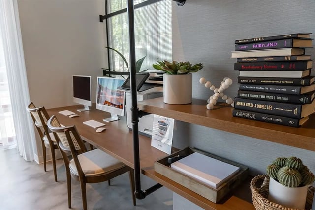 Computers chairs and books on desk study area at Shortbread Lofts in Chapel Hill Student Accommodation