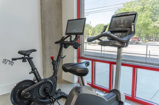 Two exercise bikes with screens Gym Equipment Image at Shortbread Lofts in Chapel Hill Student Accommodation
