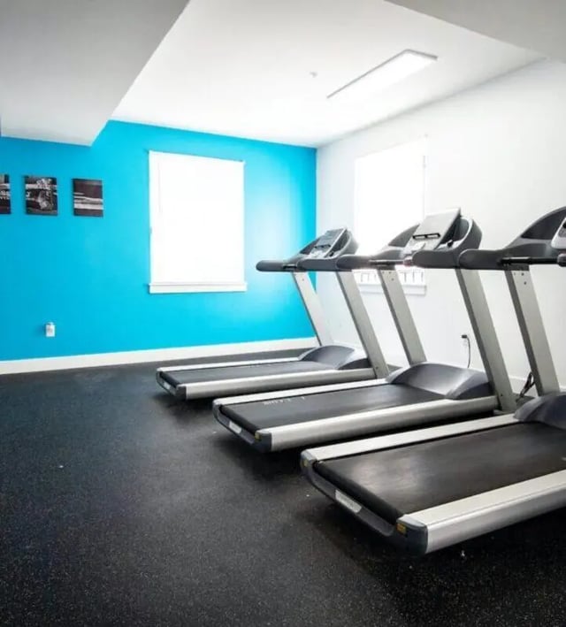 Treadmills lined up in gym playing area at The Eleanor at Walnut Apartments in Philadelphia Student Accommodation