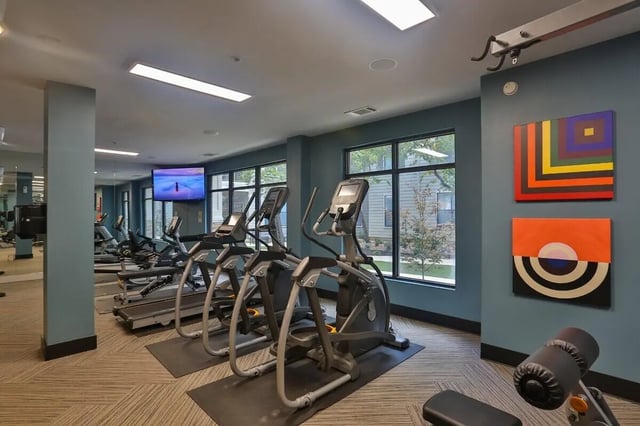 Elliptical machines and treadmills gym at Maverick Place Apartments in Arlington Student Accommodation