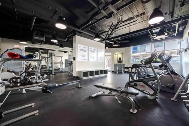 Treadmills rowing machine weight benches fitness gym at Venue On Guadalupe in Austin Student Accommodation