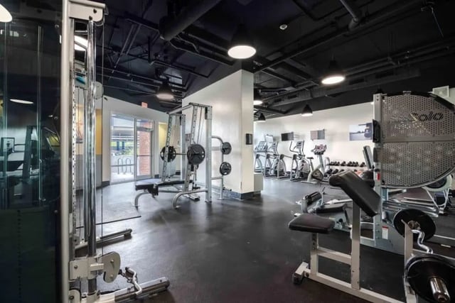 Weights machines elliptical trainers gym area at Venue On Guadalupe in Austin Student Accommodation