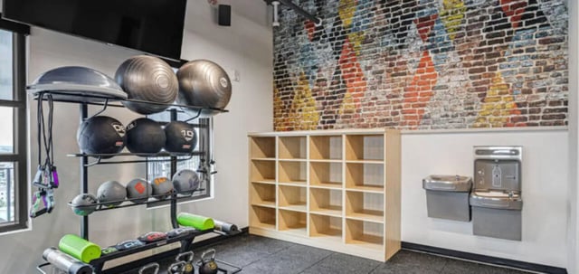Gym equipment shelves cubbies water fountain fitness area at Parc View at Commonwealth in Richmond Student Accommodation