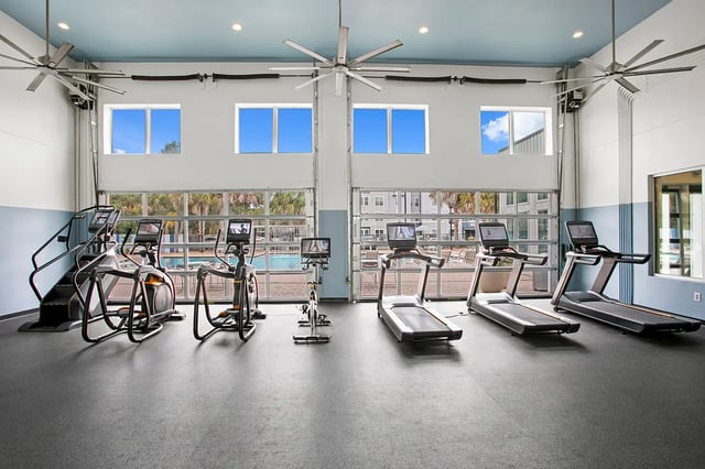 Treadmills elliptical stair climber exercise equipment gym at Venue at North Campus in Tampa Student Accommodation