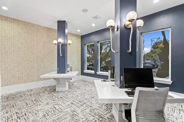 Computer desks with chairs and lamps study area at Venue at North Campus in Tampa Student Accommodation