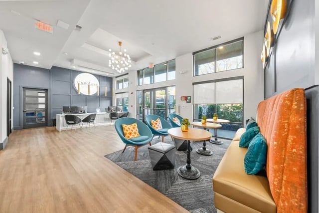 Reception area with seating lounge living room at Signature 1505 in Raleigh Student Accommodation