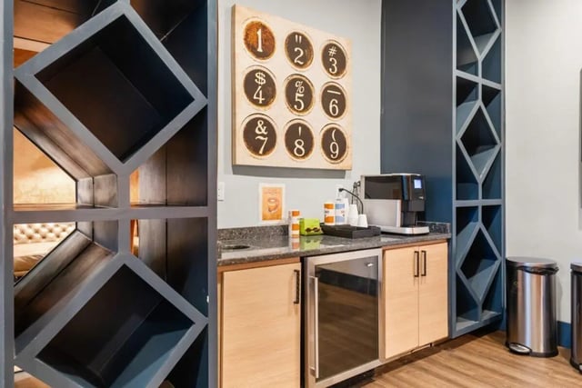 Coffee maker mini fridge and art lounge area at Signature 1505 in Raleigh Student Accommodation