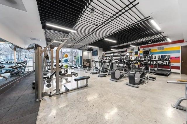 Gym equipment with treadmills and ellipticals fitness area at Signature 1909 in Austin Student Accommodation