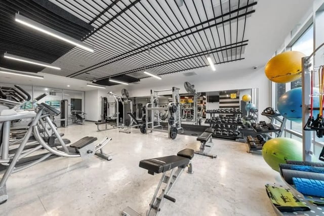 Weight machines treadmills dumbbells exercise balls gym at Signature 1909 in Austin Student Accommodation