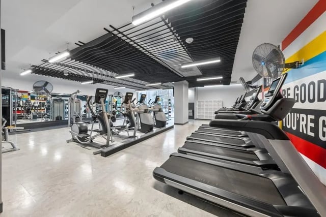 Treadmills elliptical machines and weight equipment gym at Signature 1909 in Austin Student Accommodation