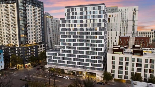 Modern apartment buildings with windows and balconies exterior at Signature 1909 in Austin Student Accommodation