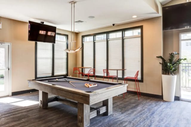Pool table with balls and cues living room at Stadium View in Bozeman Student Accommodation