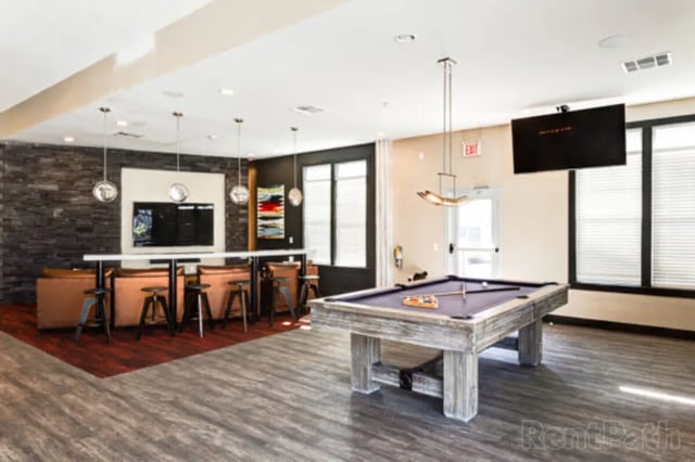 Pool table and lounge area with television living room at Stadium View in Bozeman Student Accommodation