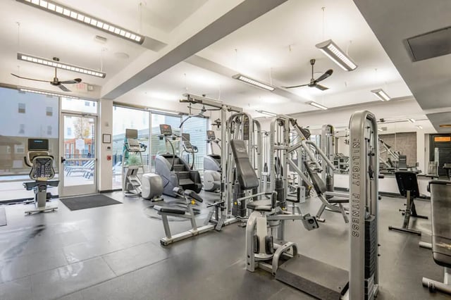 Weight machines treadmills and stair climbers gym at Hannah Townhomes & Lofts in East Lansing Student Accommodation