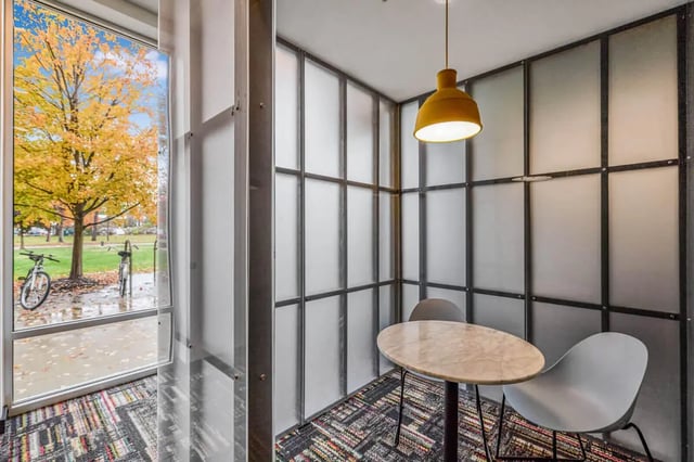 Table and chairs with window view study area at Hannah Townhomes & Lofts in East Lansing Student Accommodation