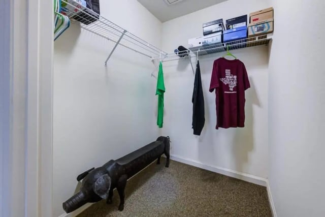 Shelves clothes bench interior closet room at Mustang Village in Wichita Falls Student Accommodation