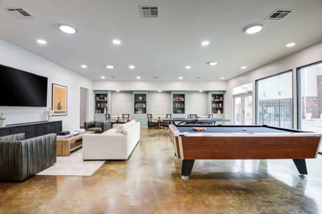 Pool table couch and ping pong table lounge at Mustang Village in Wichita Falls Student Accommodation
