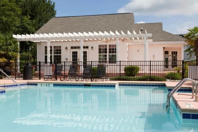 Pool and lounge chairs exterior area at University Village At Clemson in Central Student Accommodation