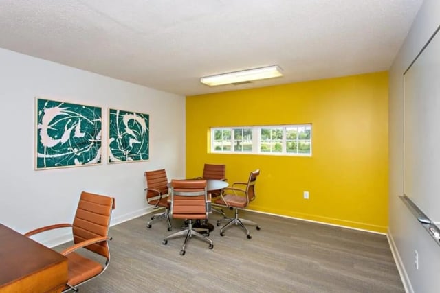 Conference room with table chairs and artwork Study area at University Village At Clemson in Central Student Accommodation