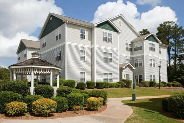 Gazebo and apartment buildings exterior at University Village At Clemson in Central Student Accommodation