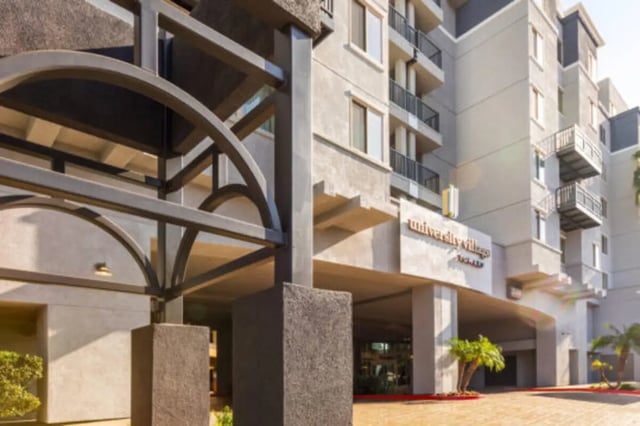 Archway entrance to University Village exterior at University Village Towers in Riverside Student Accommodation