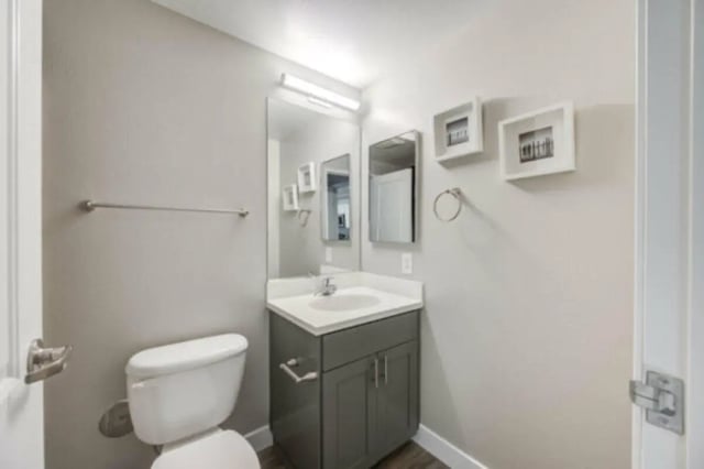 Toilet sink vanity artwork towel bar bathroom at University Village Towers in Riverside Student Accommodation
