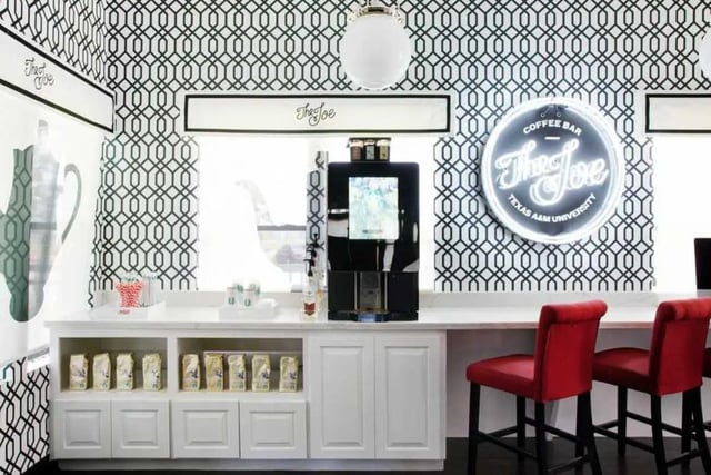 Coffee machine bags red chairs The Joe sign living room at Vesper Holdings