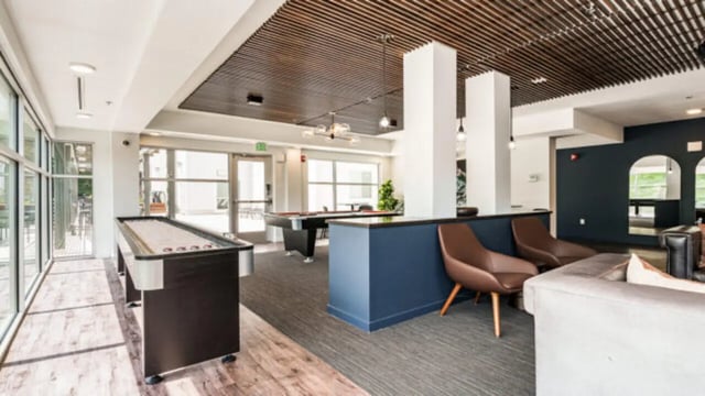 Shuffleboard pool tables and seating lounge area at The Vista Apartments in Boise Student Accommodation