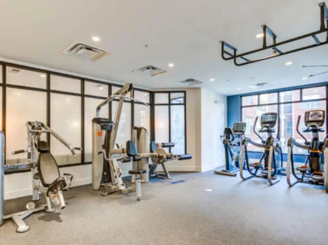 Gym equipment with weights and machines fitness center at Wertland Square in Charlottesville Student Accommodation