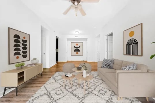 Modern living room with sofa and coffee tables Living room at Wertland Square in Charlottesville Student Accommodation