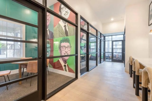 Artistic hallway with bar seating and study area at The Collective At Lubbock in Lubbock Student Accommodation