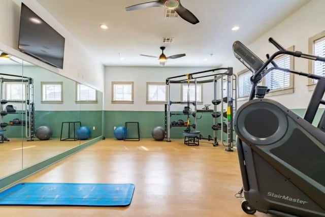 Gym equipment mirrors and yoga mat gym at The Collective At Norman in Norman Student Accommodation