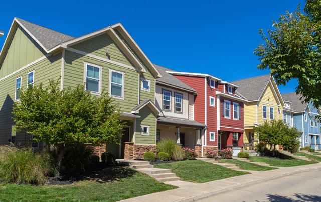 Colorful townhouses with green landscaping exterior at The Collective at Columbia in Columbia Student Accommodation