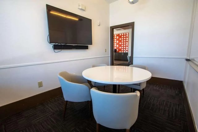 Round table four chairs television study area at The Waverly in Newark Student Accommodation