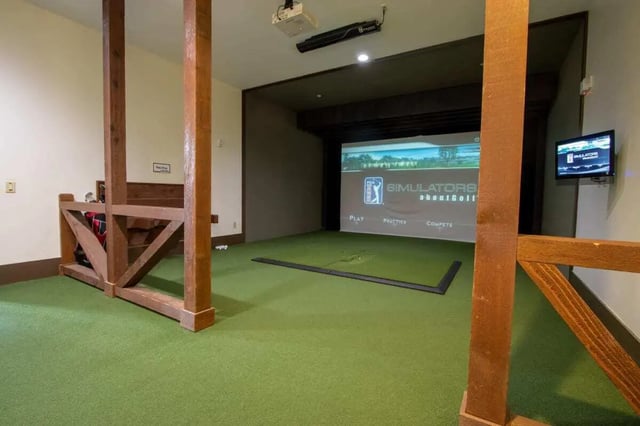 Golf simulator screen and mat playing area at The Waverly in Newark Student Accommodation