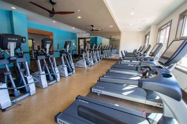 Elliptical machines and treadmills in gym facility at The Waverly in Newark Student Accommodation