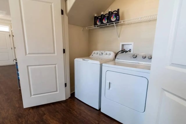 Washer dryer bottles on shelf laundry room at The Waverly in Newark Student Accommodation