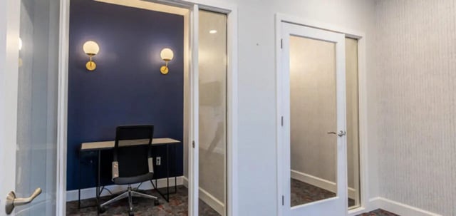 Desk chair and wall sconces study area at The Connection at Lawrence in Lawrence Student Accommodation