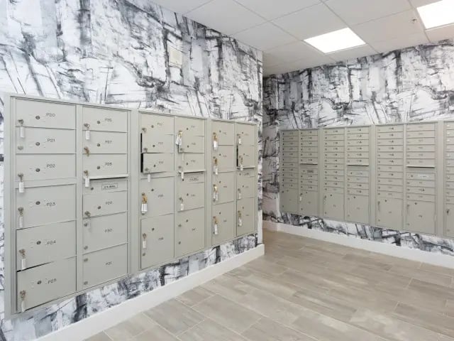 Mailboxes with numbered doors and keys common area at SoCam 290 Apartments in New Brunswick Student Accommodation