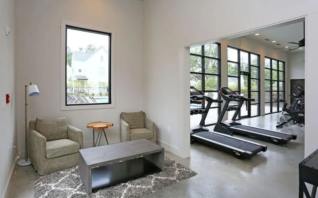 Lounge area with treadmills and exercise bikes gym at The Highlands in Reno Student Accommodation