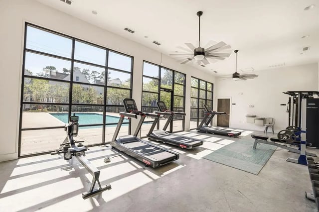 Rowing machine treadmills weights swimming pool exterior at The Highlands in Reno Student Accommodation